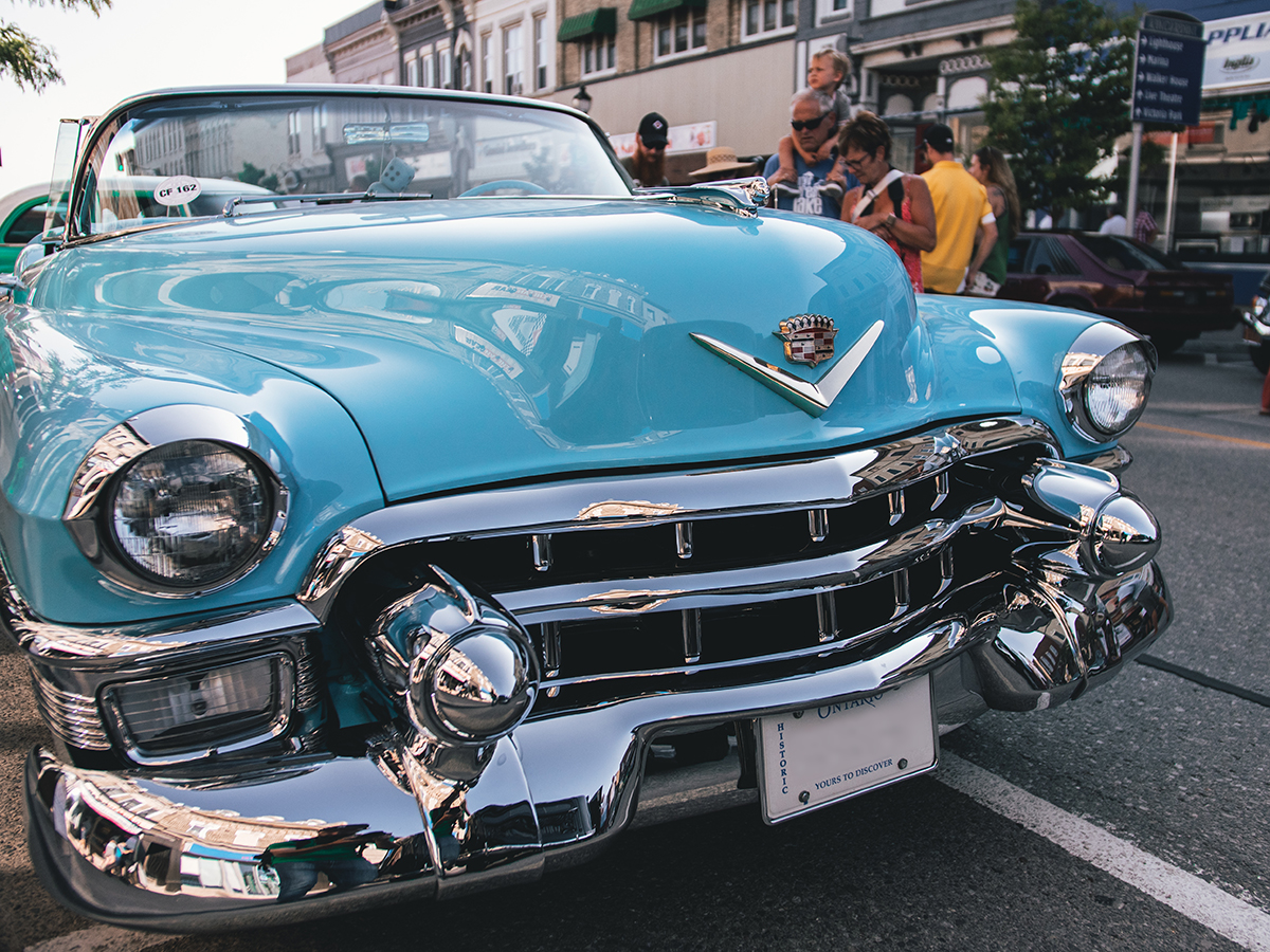 A classic car parked on the street.